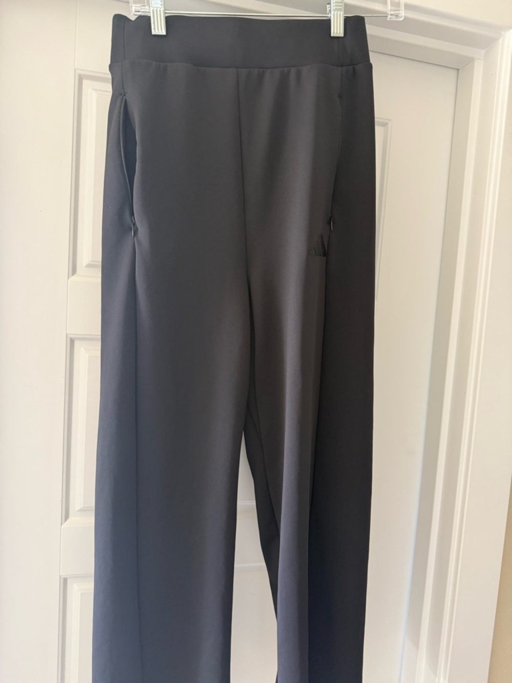 Women’s size 8 Addidas track pants. Zipper pocket